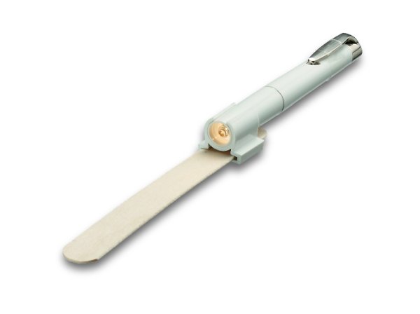 Diagnostic lamp with spatula holder